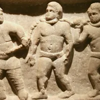 Marble relief of Roman collared slaves